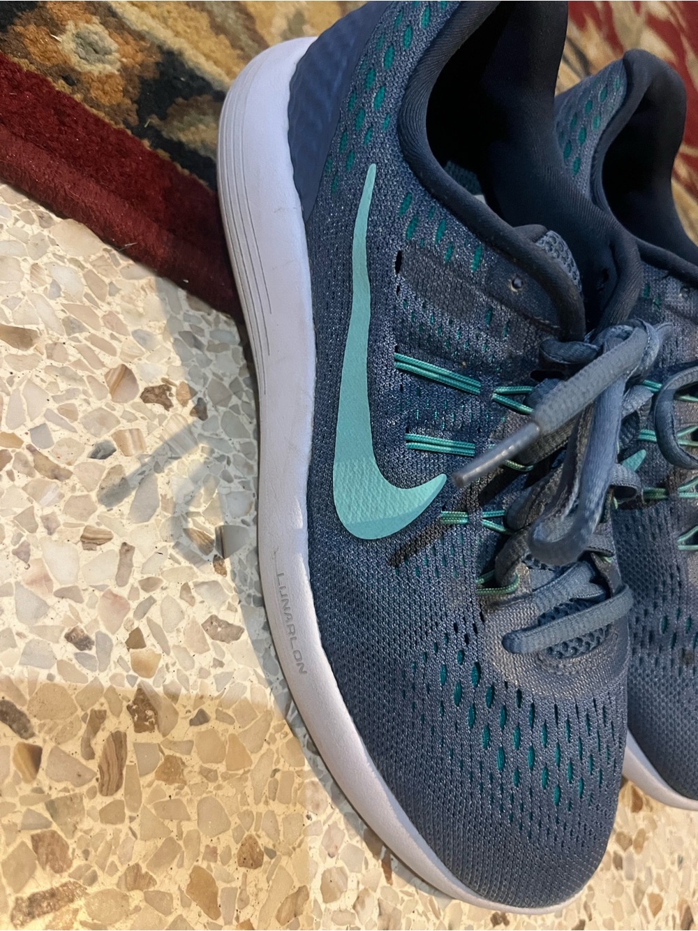 Nike Women’s Navy Blue Running Shoes with Teal Swoosh